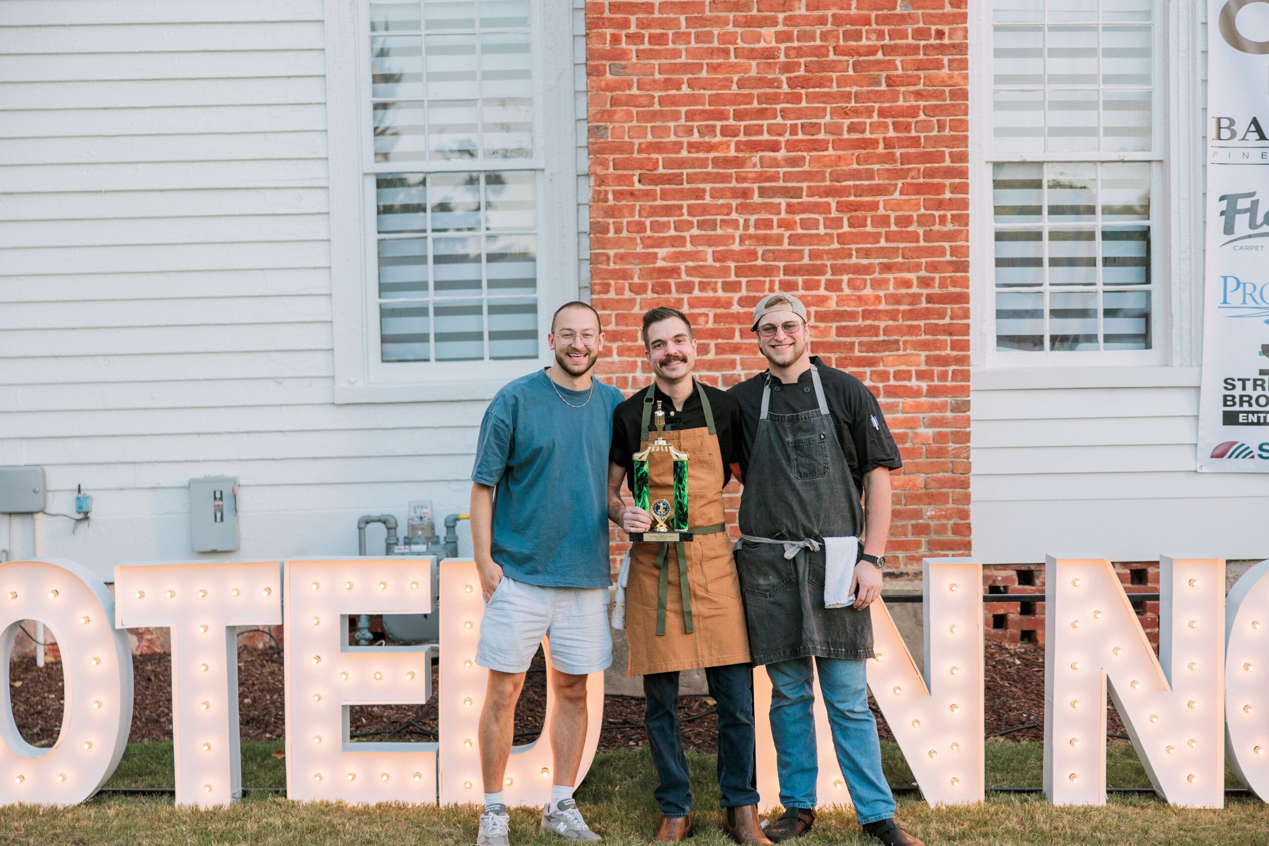 Executive Chef Kyle Fletcher of Glasshouse Kitchen with his team